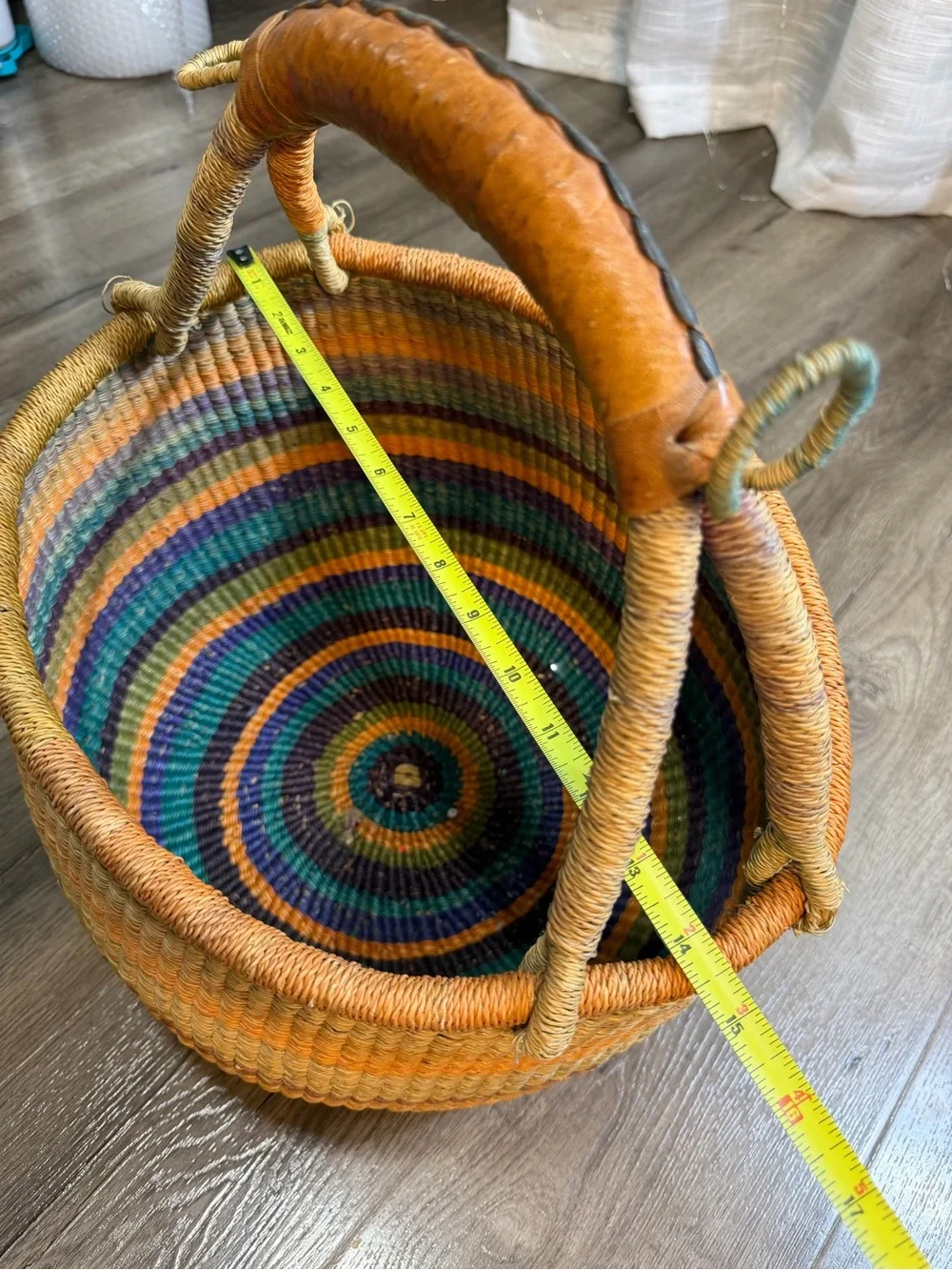 Large handmade vintage shopping basket with a leather handle.